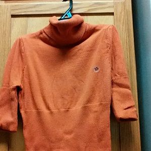 Pumpkin colored short sleeve turtleneck